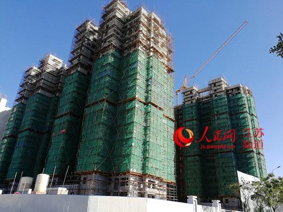 启东最新房产动态，背景、进展与地域影响力